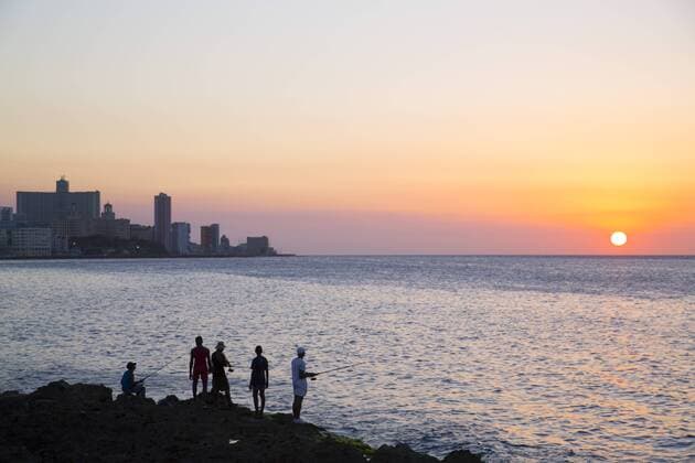 Locals fishing from the Malecon in the evening, Centro Habana, Havana, Cuba, West Indies, Central America Copyright: RichardxMaschmeyer 801-2067