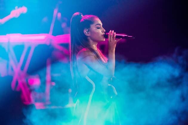 --FILE--American singer and actress Ariana Grande performs at a concert in Guangzhou city, south China s Guangdong province, 30 August 2017. Ariana Grande heats up concert in south China s Guangzhou  pbu674612_19