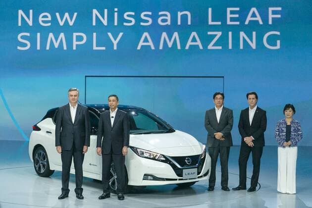 Hiroto Saikawa, Nissan President and CEO (2nd L) and the company s executives pose for the cameras alongside the new Nissan LEAF during a World Premiere event at Makuhari Messe Convention Center on September 6, 2017, Chiba, Japan. Saikawa, introduced the new model LEAF which has an extended range of 400km per charge and includes Nissan s ProPILOT autonomous driving technology. The zero emission vehicle will be available in Japan from October 2nd and in the US, Canada and Europe from January 2018.  (gxta_nissanleafworldpremiere061)