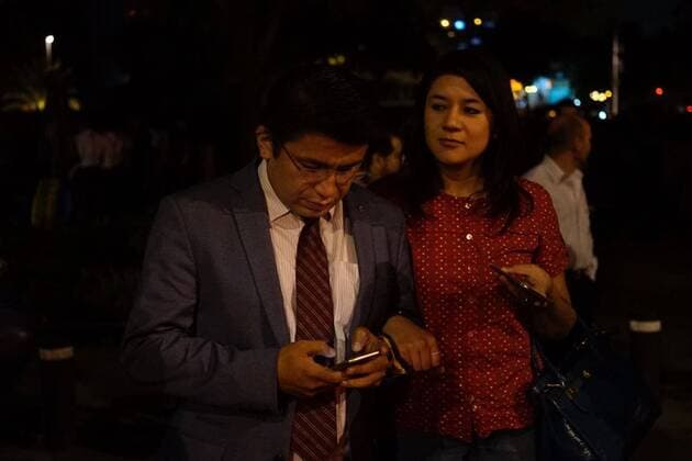 (170908) -- MEXICO CITY, Sept. 8, 2017 -- People react on a street after an earthquake jolted Mexico City, capital of Mexico, on Sept. 8, 2017. An earthquake measuring 8.2 on the Richter scale hit off the coast of Chiapas State of Mexico at 12:49 p.m. Beijing time on Friday, according to preliminary reports from the China Earthquake Networks Center. ) MEXICO-MEXICO CITY-ENVIRONMENT-EARTHQUAKE DavidxdexlaxPaz 