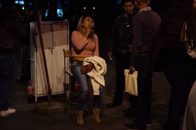 (170908) -- MEXICO CITY, Sept. 8, 2017 -- People gather on a street after an earthquake jolted Mexico City, capital of Mexico, on Sept. 8, 2017. A powerful earthquake measuring 8.0 on the Richter scale struck off Mexico s southern coast on late Thursday, the United States Geological Survey (USGS) said. ) MEXICO-MEXICO CITY-ENVIRONMENT-EARTHQUAKE DavidxdexlaxPaz 