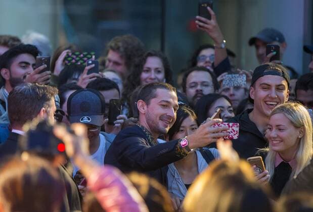 (170908) -- TORONTO, Sept. 8, 2017 -- Actor Shia LaBeouf (C) poses for photos with fans on the premiere of the film Borg McEnroe during the 2017 Toronto International Film Festival in Toronto, Canada, Sept. 7, 2017. The 2017 Toronto International Film Festival (TIFF) kicked off on Thursday with some 340 films to screen at the event, which runs until September 17. ) CANADA-TORONTO-FILM FESTIVAL-OPENING ZouxZheng 