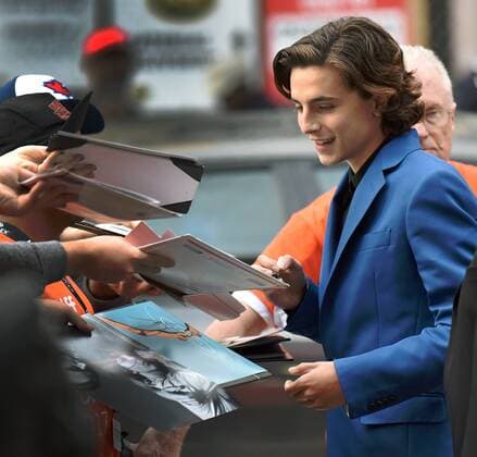 Timothee Chalamet signs autographs for fans as he arrives at the premiere of Call Me By Your Name on opening night of the 42nd Toronto International Film Festival at Ryerson Theatre in Toronto, Canada on September 7, 2017.  TOR2017090733 CHRISTINExCHEW