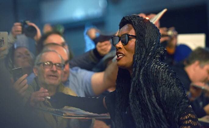 Grace Jones signs autographs for fans as she arrives at the world premiere of the documentary Grace Jones: Bloodlight and Bami on opening night of the 42nd Toronto International Film Festival at the Elgin Theatre in Toronto, Canada on September 7, 2017.  TOR2017090736 CHRISTINExCHEW