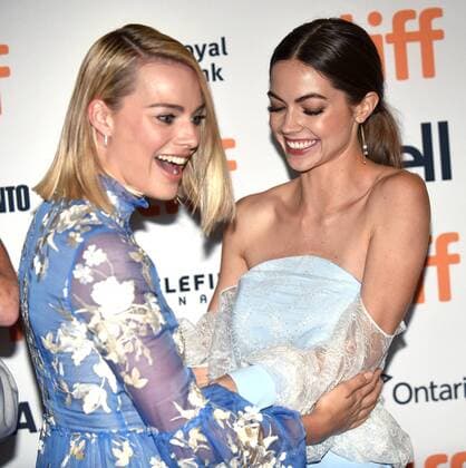 Margot Robbie (L) and Caitlin Carver arrive at the world premiere of I, Tonya at the Princess of Wales Theatre during the Toronto International Film Festival in Toronto, Canada on September 8, 2017.  TOR2017090849 CHRISTINExCHEW