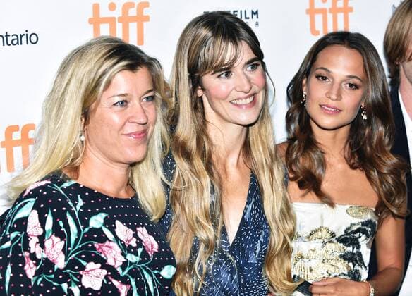 Alicia Vikander R) and Lisa Langseth (center) arrive at the Toronto International Film Festival premiere of Euphoria at the Winter Garden Theatre in Toronto, Canada on September 11, 2017.  TOR2017091135 CHRISTINExCHEW