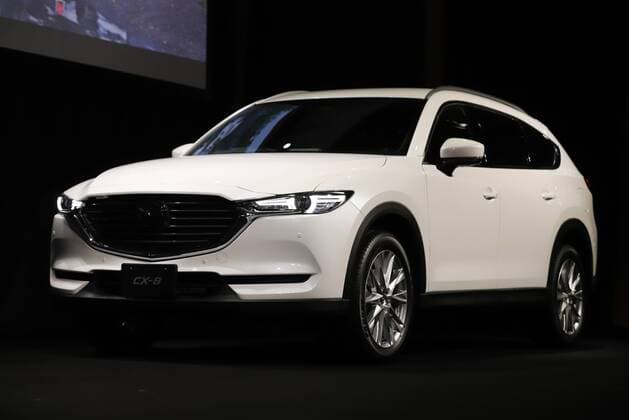 September 14, 2017, Tokyo, Japan - Japan s automaker Mazda displays the new sports utility vehicle (SUV) CX-8 in Tokyo on Thursday, September 14, 2017. The new crossover SUV has a turbo charged 2.2-litre diesel engine to drive three-row seats roomy body.  (lwxa013595)