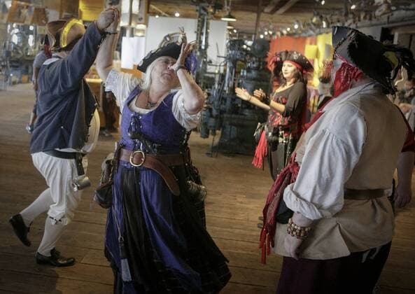 (170916) -- RICHMOND(CANADA), Sept. 16, 2017 -- People dressed in pirate costumes dance during the Pirate Weekend event at the Gulf of Georgia Cannery National Historic Site in Richmond, Canada, Sept. 16, 2017. ) CANADA-RICHMOND-PIRATE WEEKEND LiangxSen 