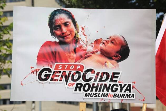 September 16, 2017 - Toronto, ONTARIO, Canada - Close-up of a sign saying Stop genocide of Rohingya Muslims in Burma as hundreds of demonstrators marched to protest against the violence against Rohingyas in Myanmar, in Toronto, Canada on September 16, 2017. Protestors called for Canada to pressure the United Nations to urge the government of Myanmar to stop the violence against Rohingya Muslims and allow Canada to investigate into the claims of genocide. Nearly 400,000 Rohingya refugees have fled into Bangladesh since late August during the outbreak of violence in the Rakhine state in Myanmar. The United Nations has called the longstanding crisis in Buddhist-majority Myanmar a textbook example of ethnic cleansing. Toronto Canada  - ZUMAn230 20170916_zaa_n230_945 Copyright: xCreativexTouchxImagingxLtdx