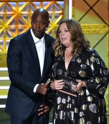 Actor-comedian Dave Chappelle and actor Melissa McCarthy onstage during the 69th annual Primetime Emmy Awards at Microsoft Theater in Los Angeles on September 17, 2017.  LAP201709170125 JIMxRUYMEN