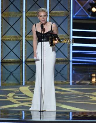 Actor Kate McKinnon (R) accepts the award for Outstanding Supporting Actress in a Comedy Series for Saturday Night Live onstage during the 69th annual Primetime Emmy Awards at Microsoft Theater in Los Angeles on September 17, 2017.  LAP201709170136 JIMxRUYMEN