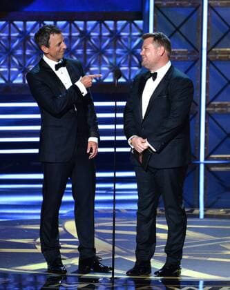 TV personalities Seth Meyers (L) and James Corden onstage during the 69th annual Primetime Emmy Awards at Microsoft Theater in Los Angeles on September 17, 2017.  LAP201709170179 JIMxRUYMEN