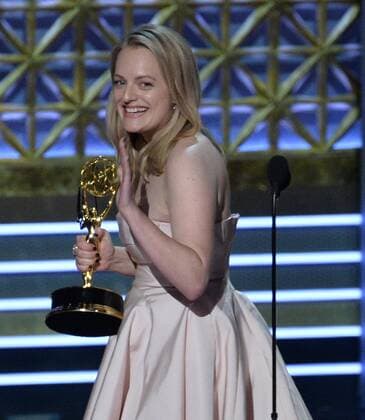 Actor Elisabeth Moss accepts the award for Outstanding Lead Actress in a Drama Series for The Handmaid s Tale onstage during the 69th annual Primetime Emmy Awards at Microsoft Theater in Los Angeles on September 17, 2017.  LAP201709170234 JIMxRUYMEN