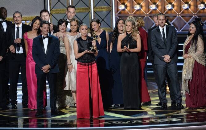 The cast and crew of The Voice accept the award for Outstanding Reality-Competition Program onstage during the 69th annual Primetime Emmy Awards at Microsoft Theater in Los Angeles on September 17, 2017.  LAP201709170300 JIMxRUYMEN