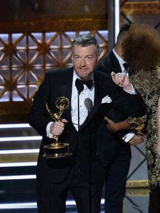 Writer producer Charlie Brooker accepts the award for Outstanding Writing for a Limited Series, Movie, or Dramatic Special for Black Mirror (episode San Junipero ) onstage during the 69th annual Primetime Emmy Awards at Microsoft Theater in Los Angeles on September 17, 2017.  LAP201709170312 JIMxRUYMEN