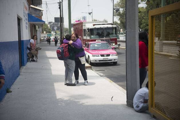 September 19, 2017 - Mexico City, Mexico - People hug on the streets after a a powerful earthquake jolted Mexico City today. A magnitude 7.1 earthquake shook central Mexico on Tuesday, collapsing some buildings and scattering rubble on the streets on the anniversary of a strong 1985 quake. Mexico City Mexico - ZUMAa136 20170919_zap_a136_020 Copyright: xJoelxAlvarezx