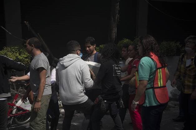 September 19, 2017 - Mexico City, Mexico City, MX - People run in the streets after a powerful earthquake jolted Mexico City today. A magnitude 7.1 earthquake shook central Mexico on Tuesday, collapsing some buildings and scattering rubble on the streets on the anniversary of a strong 1985 quake. Mexico City MX - ZUMAa136 20170919_zap_a136_051 Copyright: xJoelxAlvarezx