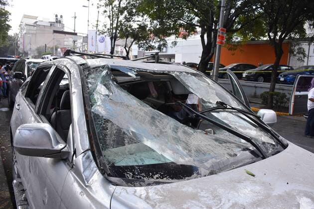 September 19, 2017 - Mexico City, Mexico, Mexico - Destroyed car is seen after 7.1 earthquake ocurred in Mexico City on September 19, 2017. On September 19, 1985, an earthquake occurred of 8.1 where material and human losses were recorded. Today is commemorated 22 years of that disaster. Mexico City Mexico  - ZUMAn230 20170919_zaa_n230_508 Copyright: xCarlosxTischlerx