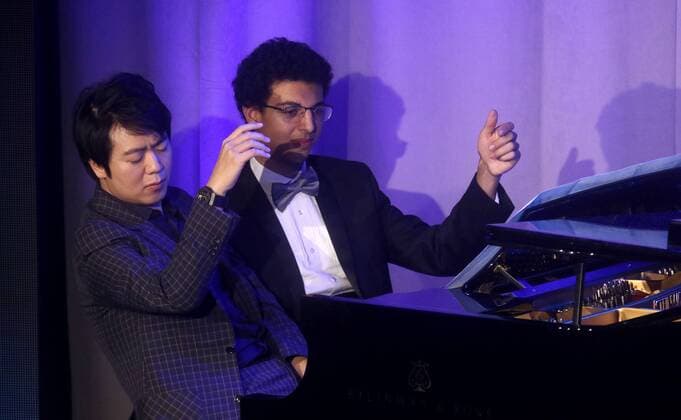 September 19, 2017 - New York, New York, U.S. - Award recipient Chinese pianist LANG LANG and his student AMIR SIRAJ perform at the Atlantic Council 2017 Global Citizen Awards held at the Intrepid Sea, Air, & Space Museum. New York U.S. - ZUMAk03_ 20170919_zaf_k03_120 Copyright: xNancyxKaszermanx