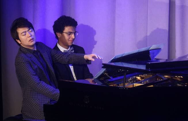 September 19, 2017 - New York, New York, U.S. - Award recipient Chinese pianist LANG LANG and his student AMIR SIRAJ perform at the Atlantic Council 2017 Global Citizen Awards held at the Intrepid Sea, Air, & Space Museum. New York U.S. - ZUMAk03_ 20170919_zaf_k03_123 Copyright: xNancyxKaszermanx