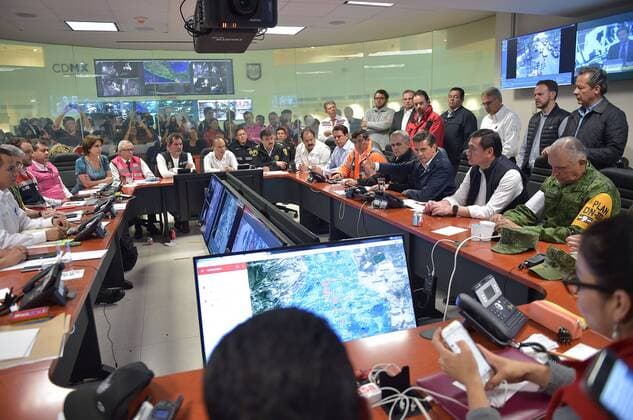 (170920) -- MEXICO CITY, Sept. 20, 2017 -- Image provided by on Sept. 19, 2017 shows Mexican President Enrique Pena Nieto (3rd R, front) holding a work meeting in the Mexico City s Control, Command, Communication, Computer and Quality Center after an earthquake in Mexico City, capital of Mexico. At least 216 people have been killed after a powerful earthquake hit central Mexico on Tuesday, with the death toll expected to rise due to the scale of the temblor, the country s civil protection agency said. ) (dtf) MEXICO-MEXICO CITY-EARTHQUAKE MEXICO SxPRESIDENCY
