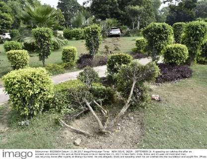 NEW DELHI, INDIA - SEPTEMBER 21: A speeding car catches fire after an accident and entered in the park at Mandi House circle on September 21, 2017 in New Delhi, India. Police said 21-year-old inebriated man, was returning home after a party at Shangri-La hotel. He was allegedly drunk and speeding when his car crashed into the roundabout and caught fire. (Photo by Arvind Yadav Hindustan Times ) Drunk Youth Crashes Into Delhi s Mandi House Roundabout, Car Catches Fire