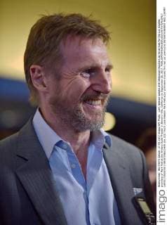 Liam Neeson speaks with television reporters as he arrives for the Los Angeles premiere of Mark Felt at the Writers Guild Theater in Beverly Hills, California on September 26, 2017.  LAP20170926700 CHRISTINExCHEW