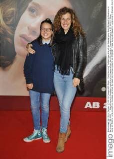 Clelia Huna with Daughter Luna Arrival to Premiere from Rock My Heart in Cinemaxx in Berlin at 27 09 2017