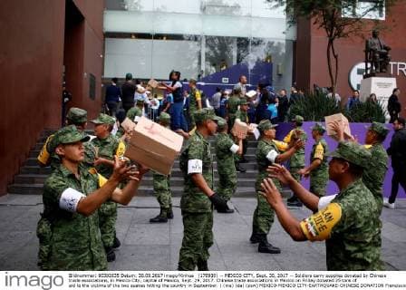 (170930) -- MEXICO CITY, Sept. 30, 2017 -- Soldiers carry supplies donated by Chinese trade associations, in Mexico City, capital of Mexico, Sept. 29, 2017. Chinese trade associations in Mexico on Friday donated 25 tons of aid to the victims of the two quakes hitting the country in September. ) (ma) (da) (psw) MEXICO-MEXICO CITY-EARTHQUAKE-CHINESE DONATION FranciscoxCanedo 