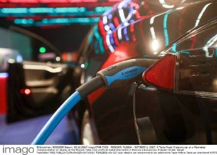 MOSCOW, RUSSIA - OCTOBER 2, 2017: A Tesla Model S electric car at a Mennekes charging station on display at the Moscow Tesla Club unofficial dealership centre in Moscow s Kutuzovsky Prospekt Street. Sergei Fadeichev TASS  TS062B91