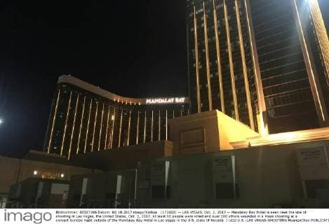 (171002) -- LAS VEGAS, Oct. 2, 2017 -- Mandalay Bay Hotel is seen near the site of shooting in Las Vegas, the United States, Oct. 2, 2017. At least 50 people were killed and over 200 others wounded in a mass shooting at a concert Sunday night outside of the Mandalay Bay Hotel in Las Vegas in the U.S. state of Nevada. ) (djj) U.S.-LAS VEGAS-SHOOTING HuangxChao 