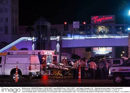 Oct 2, 2017 - Las Vegas, Nevada, U.S. - Medical workers stage in the intersection of Tropicana Avenue and Las Vegas Boulevard South after a mass shooting at a music festival on the Las Vegas Strip Sunday, Oct. 1, 2017. At least 58 people died in the shooting and 515 people were injured Sunday night. The shooting has become the deadliest in modern U.S. history. The suspect, 64-year-old Stephen Paddock, was found dead in his Mandalay Bay hotel room. Las Vegas U.S. - ZUMAl154 20171002_rua_l154_925 Copyright: xStevexMarcus LasxVegasxSunx