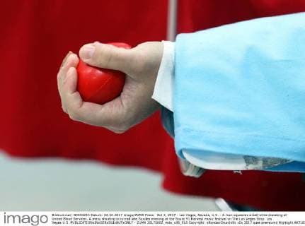 Oct 2, 2017 - Las Vegas, Nevada, U.S. - A man squeezes a ball while donating at United Blood Services. A mass shooting occurred late Sunday evening at the Route 91 Harvest music festival on The Las Vegas Strip. Las Vegas U.S.  - ZUMA 20171002_mda_c98_018 Copyright: xRondaxChurchillx