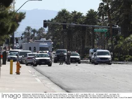 October 2, 2017 - Las Vegas, NV, U.S. - 02 October 2017 - Las Vegas, NV - Mandalay Bay Resort and Casino. A gunman on the 32nd floor of Las Vegas hotel Mandalay Bay and Casino rained a rapid-fire barrage on an outdoor concert, Route 91 Harvest Festival, leaving at least 59 people dead, injuring 527 others, and sending thousands fleeing for cover, in one of the deadliest mass shootings in American history. Photo Credit: MJT AdMedia Las Vegas U.S. - ZUMAa123 20171002_zaa_a123_022 Copyright: xMjtAdmediax
