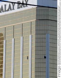 Many firearms found after Las Vegas mass shooting Photo taken on Oct. 2 2017 shows the Mandalay Bay Resort and Casino, near the site of a mass shooting in Las Vegas, Nevada the previous day. Seen on the sides of the hotel were two broken windows through which a man in his 50s opened fire during an outdoor music festival. 