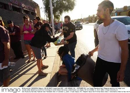 LAS VEGAS, NV - OCTOBER 02: Las Vegas Resident Jack Wagner passing out water and snacks after donating blood this morning at United Blood Services in Northwest Las Vegas, NV on October 2, 2017, after a mass shooting at the Route 91 Harvest Festival near Mandalay Bay on October 1, 2017, in Las Vegas, NV. Wagner has a few friends there were in attendance that he has not heard from. (Photo by Doug Kranz Icon Sportswire) 289319