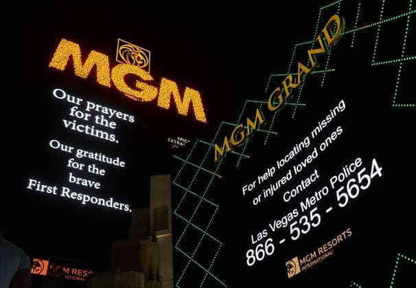 Signage offering prayers and help for missing loved ones appears on the marquee of the MGM Hotel, 24-hours after the deadliest mass shooting in U.S. history in Las Vegas on October 2, 2017. Fifty-nine people were killed and hundreds injured late Sunday at an outdoor country music festival on the Las Vegas Strip.  LAV20171002801 JIMxRUYMEN