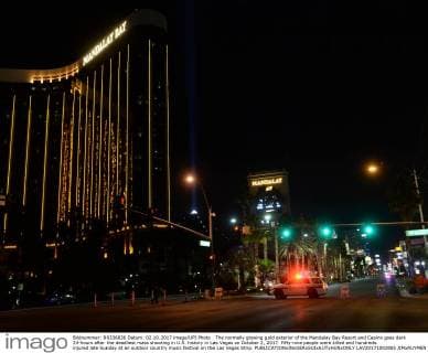 The normally glowing gold exterior of the Mandalay Bay Resort and Casino goes dark 24-hours after the deadliest mass shooting in U.S. history in Las Vegas on October 2, 2017. Fifty-nine people were killed and hundreds injured late Sunday at an outdoor country music festival on the Las Vegas Strip.  LAV20171002805 JIMxRUYMEN