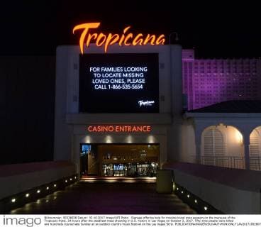 Signage offering help for missing loved ones appears on the marquee of the Tropicana Hotel, 24-hours after the deadliest mass shooting in U.S. history in Las Vegas on October 2, 2017. Fifty-nine people were killed and hundreds injured late Sunday at an outdoor country music festival on the Las Vegas Strip.  LAV20171002807 JIMxRUYMEN