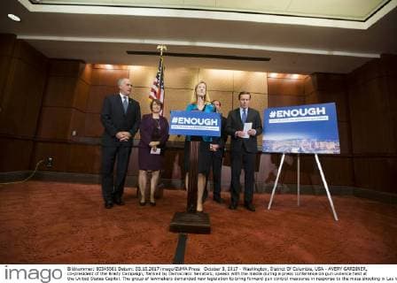 October 3, 2017 - Washington, District Of Columbia, USA - AVERY GARDINER, co-president of the Brady Campaign, flanked by Democratic Senators, speaks with the media during a press conference on gun violence held at the United States Capitol. The group of lawmakers demanded new legislation to bring forward gun control measures in response to the mass shooting in Las Vegas. Washington USA - ZUMAe113 20171003_zap_e113_100 Copyright: xAlexxEdelmanx