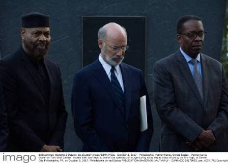 October 3, 2017 - Philadelphia, Pennsylvania, United States - Pennsylvania Governor Tom Wolf (center) listens with bow head to one of the speakers on stage during a Las Vegas mass shooting victims vigil, in Center City Philadelphia, PA, on October 3, 2017. Philadelphia United States  - ZUMAn230 20171003_zaa_n230_782 Copyright: xBastiaanxSlabbersx