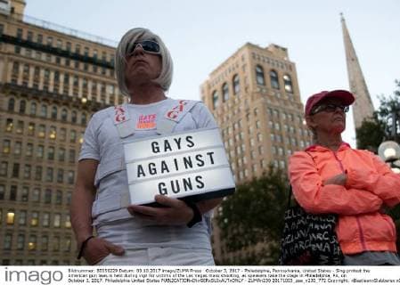 October 3, 2017 - Philadelphia, Pennsylvania, United States - Sing protest the American gun laws is held during vigil for victims of the Las Vegas mass shooting, as speakers take the stage in Philadelphia, PA, on October 3, 2017. Philadelphia United States  - ZUMAn230 20171003_zaa_n230_772 Copyright: xBastiaanxSlabbersx