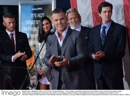 Cast member Josh Brolin speaks as cast member listen during the premiere of the motion picture biographical drama Only the Brave at the Regency Village Theatre in the Westwood section of Los Angeles on October 8, 2017. Storyline: Based on the true story of the Granite Mountain Hotshots, a group of elite firefighters who risk everything to protect a town from a historic wildfire.  LAP2017100831 JIMxRUYMEN