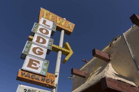 May 16, 2017 - Albuquerque, New Mexico, United States - Albuquerque, New Mexico: Vintage sign of the Tewa Motor Lodge along Central Avenue. The motel was built in 1946 in the Pueblo Revival style along historic Route 66 and was listed on the National Register of Historic Places in 1998. Though the sign is not original, the buildingÃ¢â‚¬â ¢s use of neon has been judged as the best in the city. The Tewa Motor Lodge is still in operation as a motel and listed on the National Park ServiceÃ¢â‚¬â ¢s Route 66 Ã¢â‚¬oeDiscover Our Shared Heritage Travel ItineraryÃ¢ Albuquerque United States - ZUMAg235 20170516_zap_g235_008 Copyright: xPaulxChristianxGordonx