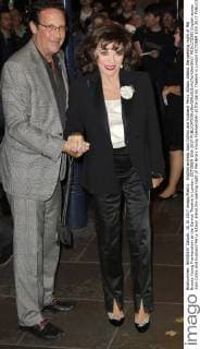 English actress Joan Collins and husband Percy Gibson attend the opening night of Mel Brooks Young Frankenstein at the Garrick Theatre in London. OCTOBER 10th 2017  MESx172392