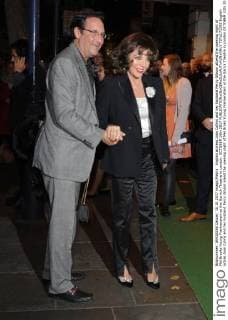 English actress Joan Collins and her husband Percy Gibson attend the opening night of Mel Brooks Young Frankenstein at the Garrick Theatre in London. OCTOBER 10th 2017  TSTx172393
