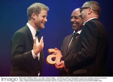 . 12 10 2017. London, United Kingdom. Prince Harry receives a posthumous Attitude Legacy Award on behalf of his mother Diana, Princess of Wales, from Ian Walker, right, and Julian La Bastide at the Attitude Awards in London.  xROTAx xi-Imagesx IIM-16127-0002