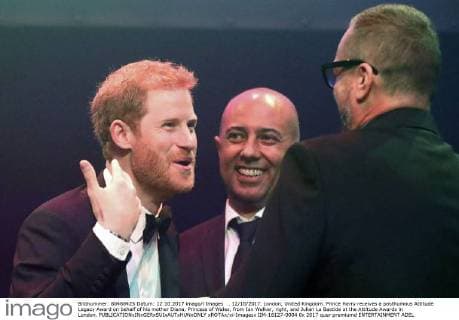 . 12 10 2017. London, United Kingdom. Prince Harry receives a posthumous Attitude Legacy Award on behalf of his mother Diana, Princess of Wales, from Ian Walker, right, and Julian La Bastide at the Attitude Awards in London.  xROTAx xi-Imagesx IIM-16127-0004