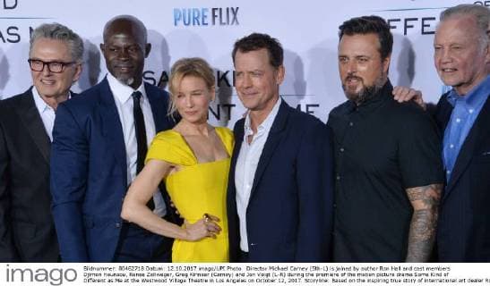 Director Michael Carney (5th-L) is joined by author Ron Hall and cast members Djimon Hounsou, Renee Zellweger, Greg Kinnear (Carney) and Jon Voigt (L-R) during the premiere of the motion picture drama Some Kind of Different as Me at the Westwood Village Theatre in Los Angeles on October 12, 2017. Storyline: Based on the inspiring true story of international art dealer Ron Hall, who must befriend a dangerous homeless man in order to save his struggling marriage to his wife, a woman whose dreams will lead all three of them on the journey of their lives.  LAP2017101236 JIMxRUYMEN