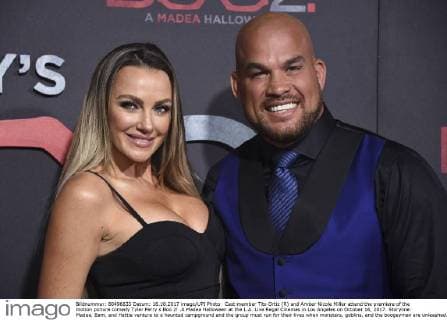 Cast member Tito Ortiz (R) and Amber Nicole Miller attend the premiere of the motion picture comedy Tyler Perry s Boo 2! .A Madea Halloween at the L.A. Live Regal Cinemas in Los Angeles on October 16, 2017. Storyline: Madea, Bam, and Hattie venture to a haunted campground and the group must run for their lives when monsters, goblins, and the boogeyman are unleashed.  LAP20171016825 PHILxMCCARTEN